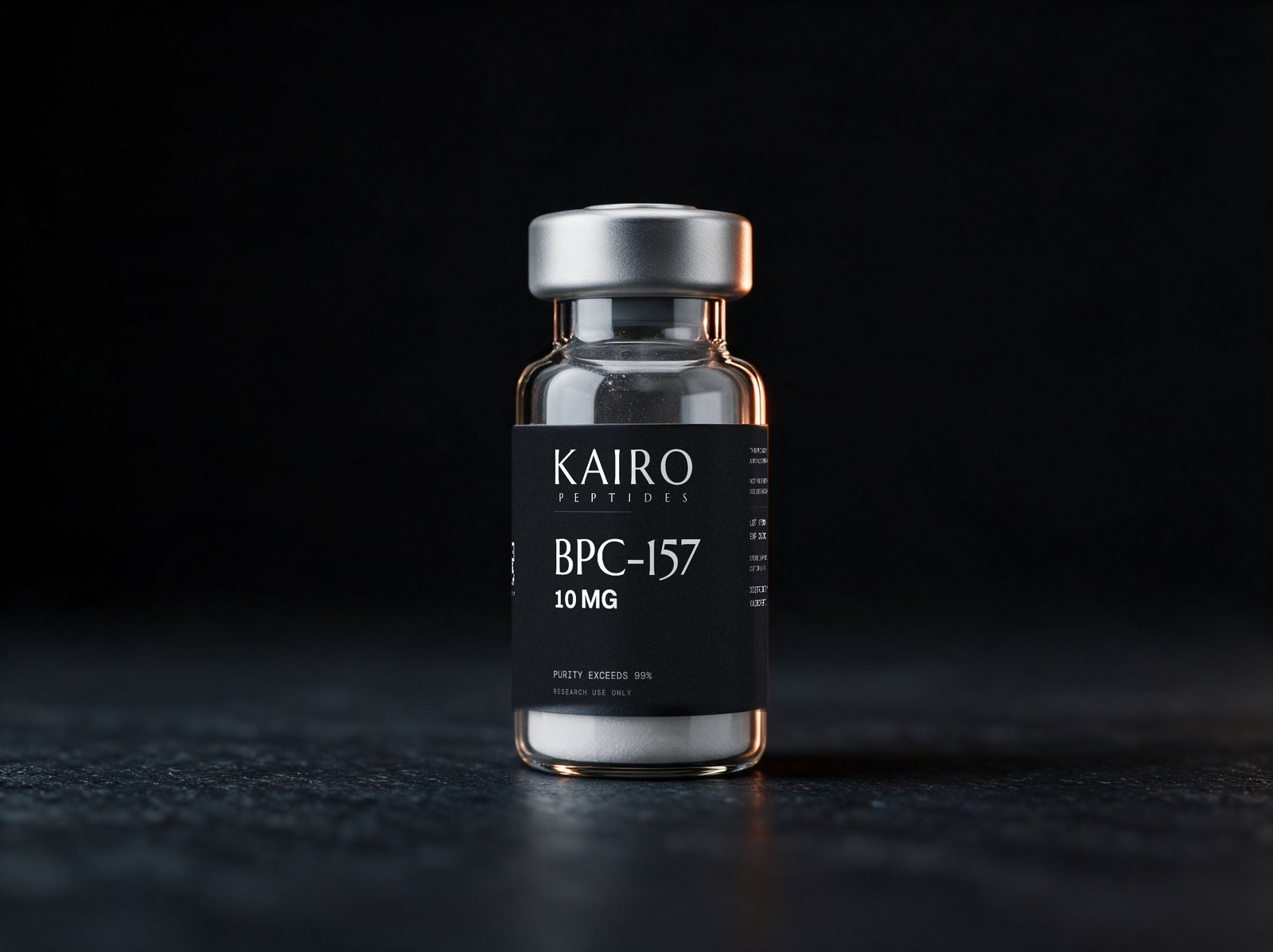 KAIRO BPC-157 vial, its printed label showing the compound, 10 MG, purity, the research-use-only line and the lot QR code